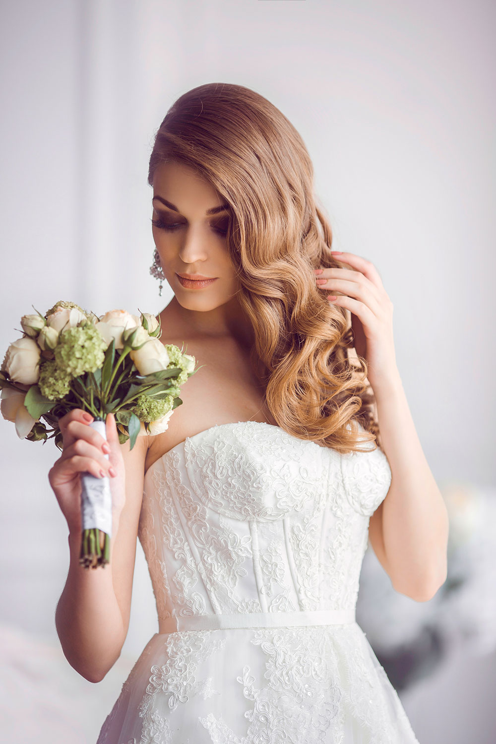 Long and wavy witha side parting Wedding hairstyle for ladies