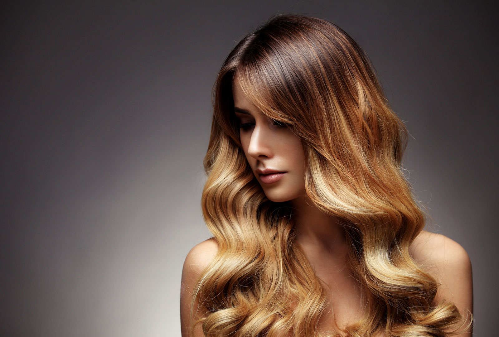 The brassy layered waves ombre brown to blonde